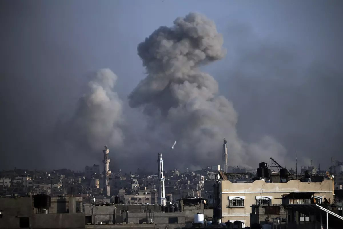 Smoke rises after Israeli bombardments in Khan Yunis, southern Gaza Strip