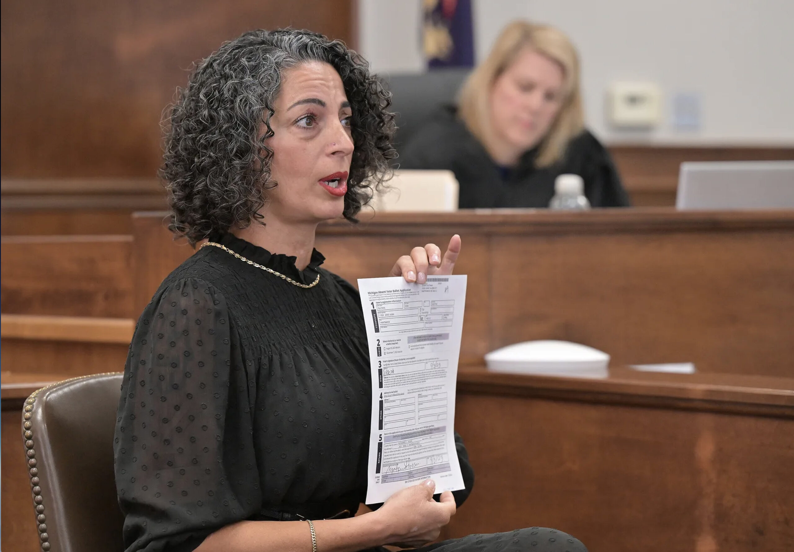 Rana Faraj, the City Clerk of Hamtramck, testified before Michigan’s 31st District Court during the preliminary hearing in the election fraud case against City Councilman Mohammed Hassan on Thursday, October 16, 2025, before Judge Alexis G. Krot. - Photo by the Detroit News