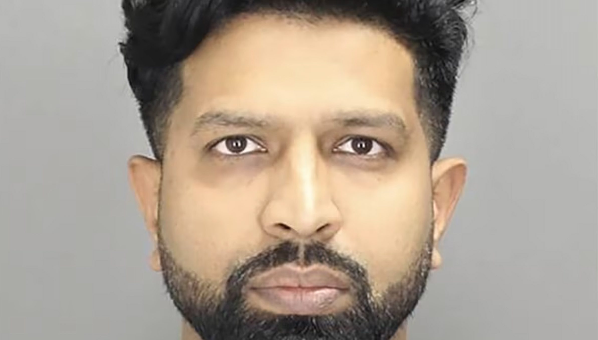 This booking photo provided by the Oakland County Sheriff's Department shows Dr. Oumair Aejaz, of Rochester Hills, Michigan. – Photo a courtesy of the Oakland County Sheriff's Department