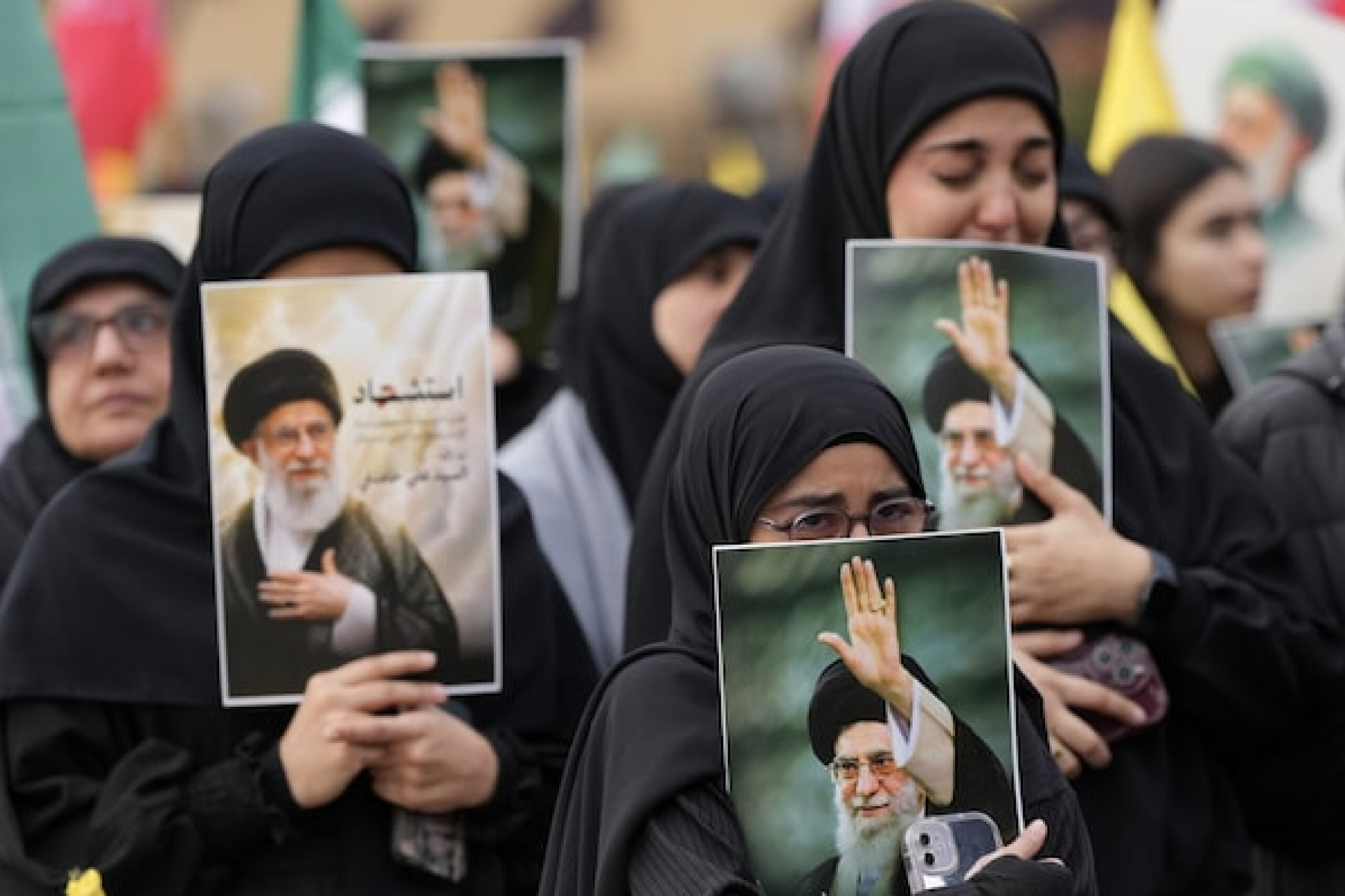 People mourn the death of Iran’s supreme leader Ayatollah Ali Khamenei, who was assassinated in a joint U.S. and Israeli strikes, at a square in Tehran