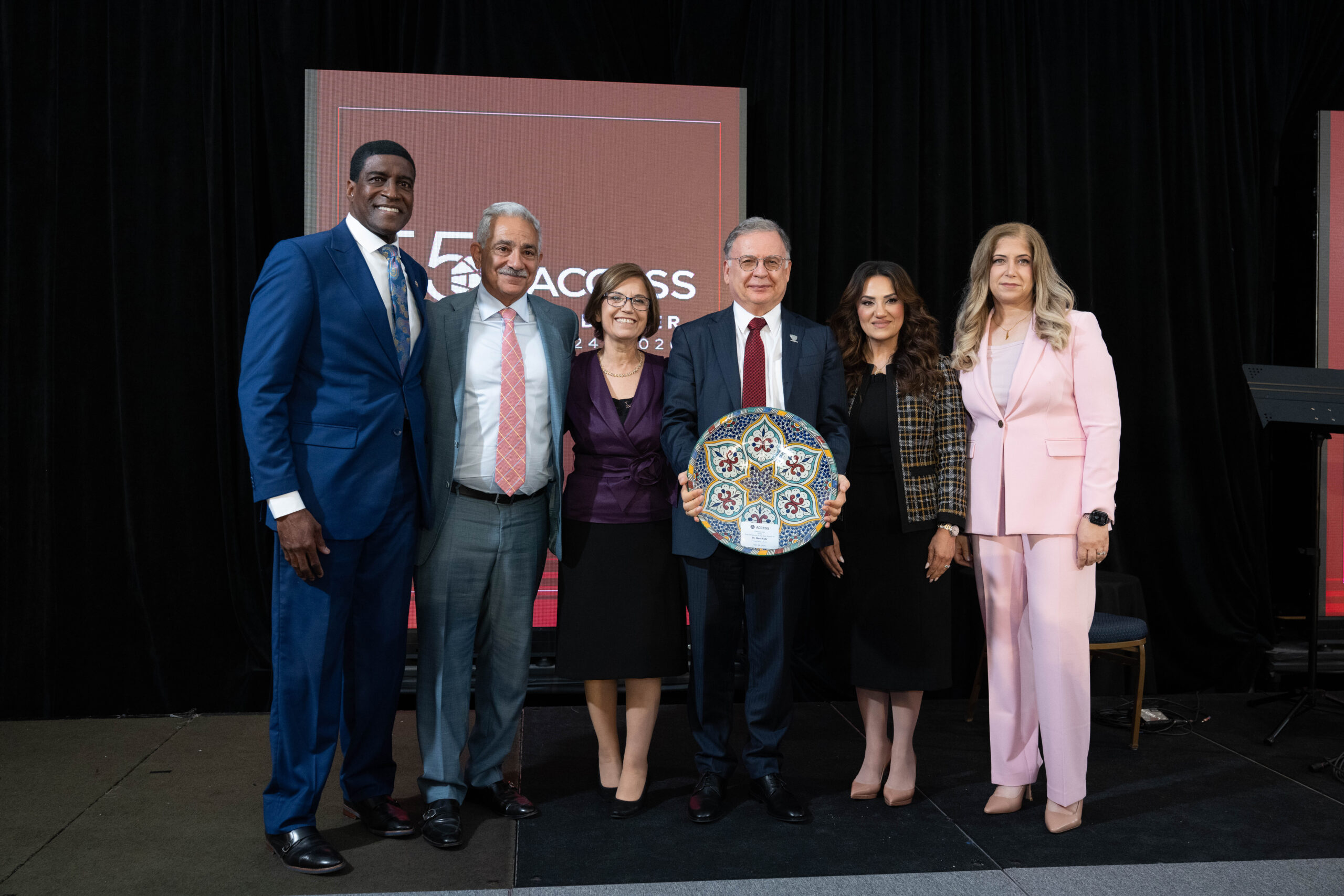 Dean of School of Medicine at Wayne State University Dr. Wael Sakr, receives his award at the ACCESS 55th Anniversary Gala at the Marriott Hotel in Downtown Detroit, Friday, April 24.