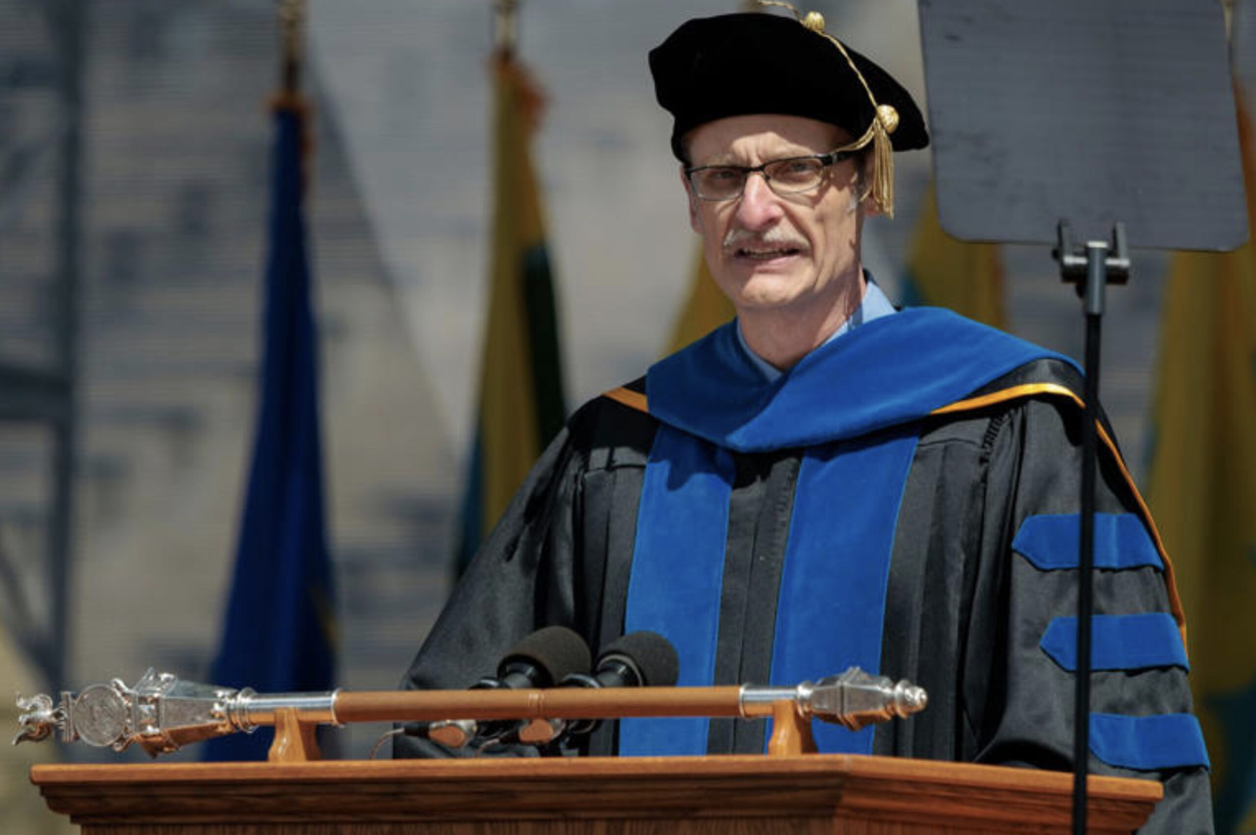 Derek Peterson, chair of the University of Michigan Faculty Senate, speaks during the University of Michigan's spring commencement ceremony at Michigan Stadium in Ann Arbor, Mich., Saturday, May 2. –
