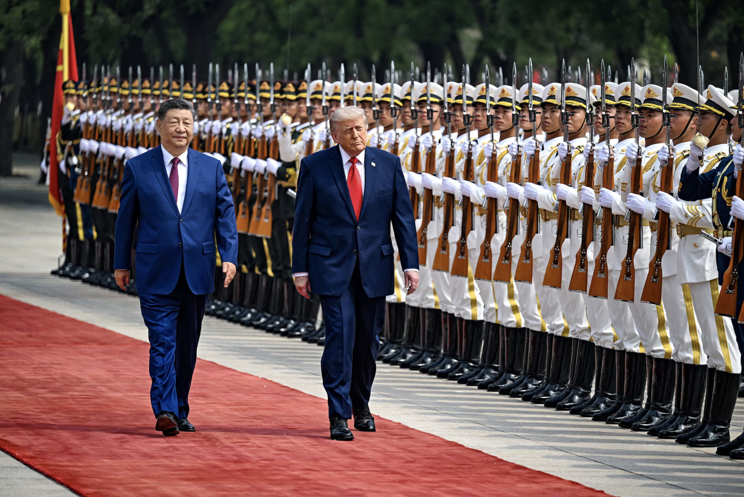 Chinese President Xi Jinping welcomes Donald Trump in Beijing.